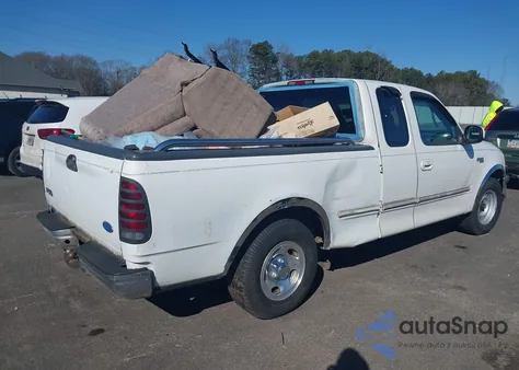 1997 Ford F-150 Lariat/Standard/Xl/Xlt z USA, uszkodzony, nr VIN 1FTDX1760VNA42871